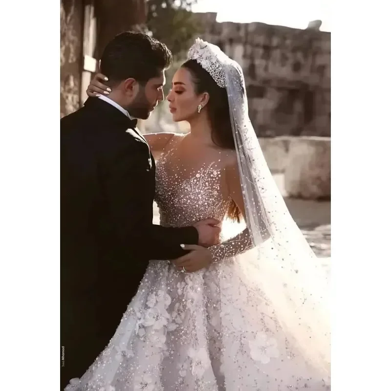 

Индивидуальные Дубайские арабские новые модные кружевные бальные платья Свадебные платья с длинными рукавами и 3d цветами из бисера Свадебное платье