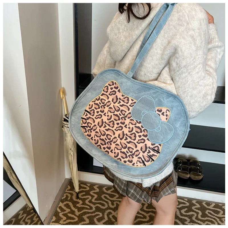 Sanrio Hello Kitty cartoon leopard print fashion women's backpack new large capacity PU pitot bag casual shoulder messenger bag