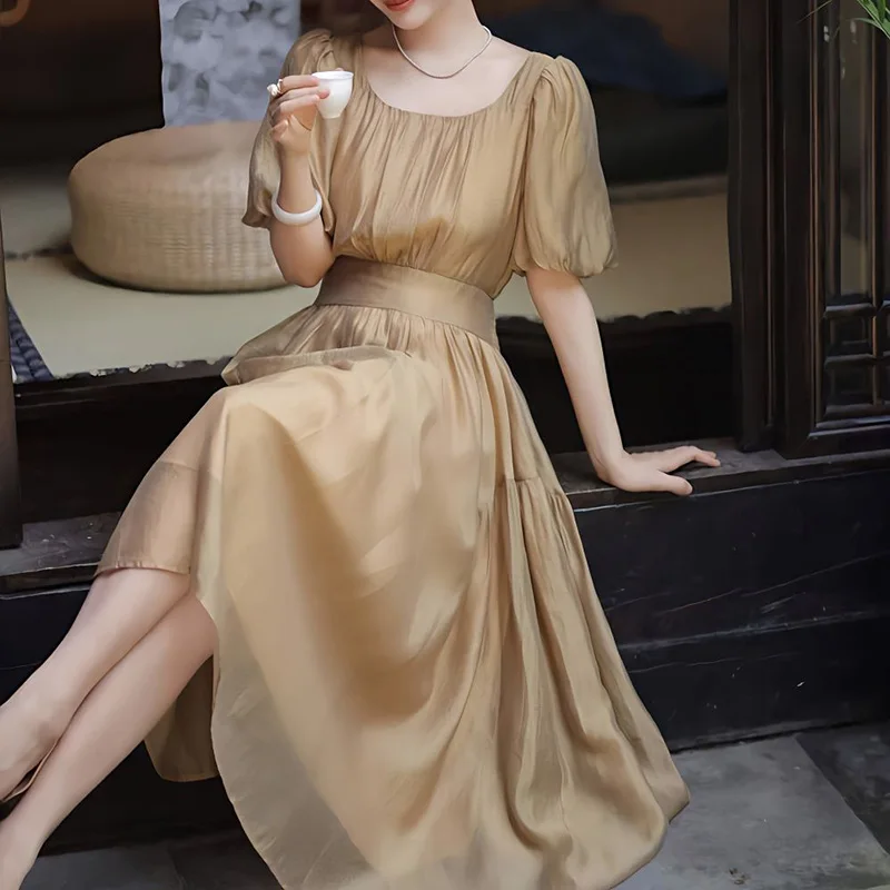 

Elegant O-Neck Solid Color Spliced Folds Puff Sleeve Vintage Dress Women Clothing 2024 Summer New Loose Office Lady Party Dress