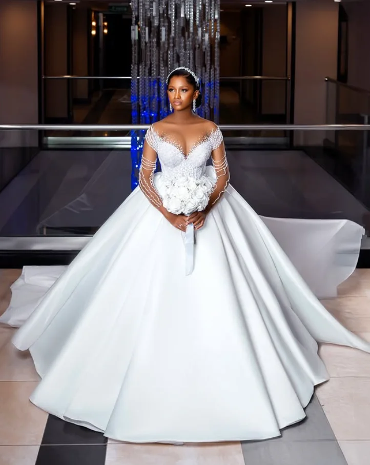 

Princess Luxury African Wedding Dresses Illusion Long Sleeve Crystal Sweep Train Church Garden Bride Gown Garment Customized