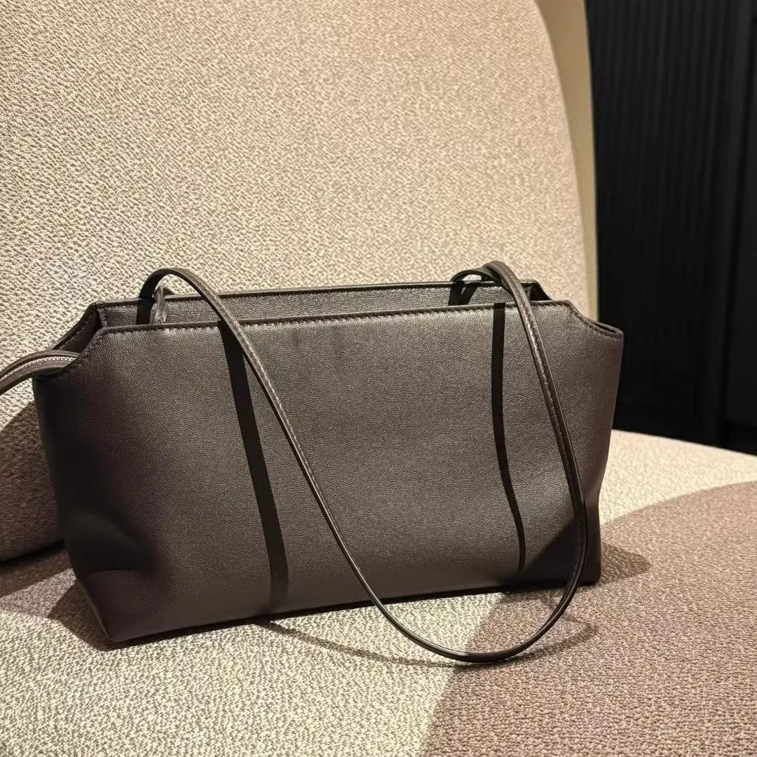 

Импортная женская сумка из овчины на плечо, весна-лето 2026, новый стиль, повседневный нишевый дизайн, ручная/наплечная сумка