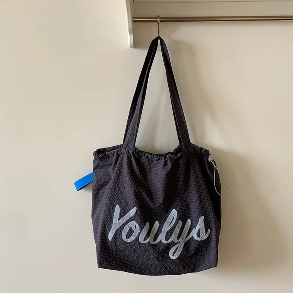 

Canvas Drawstring Tote Bag Large Capacity Korean Style Nylon Shoulder Bag Shopping Bag Beach Bag Letter Printed Handbag Women
