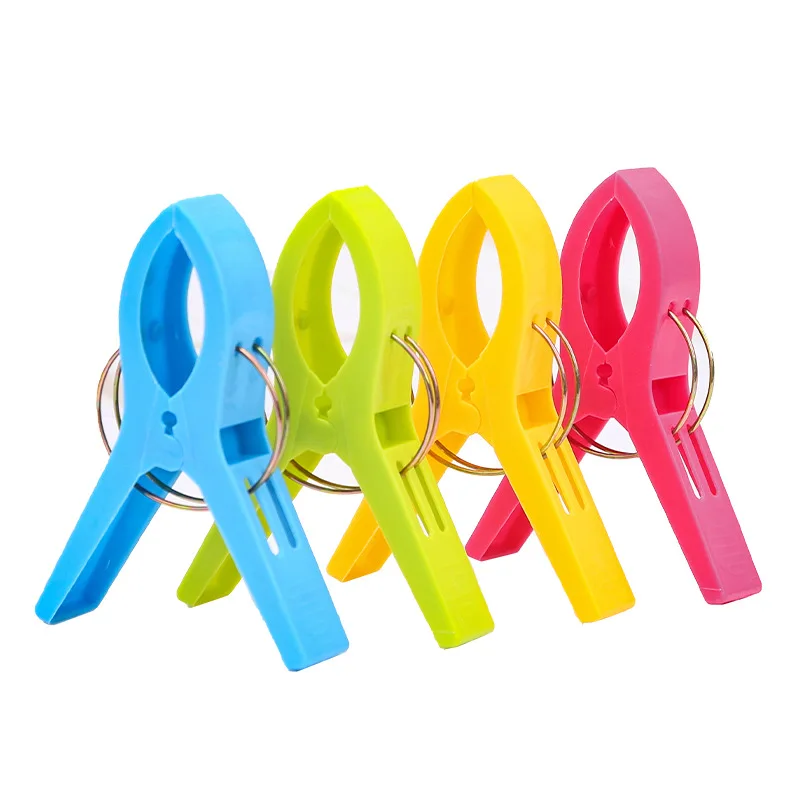 4 pezzi Clip per vestiti di colore brillante di grandi dimensioni mollette per asciugamani da spiaggia in plastica Clip per mollette per lettino per la casa armadio di alta qualità