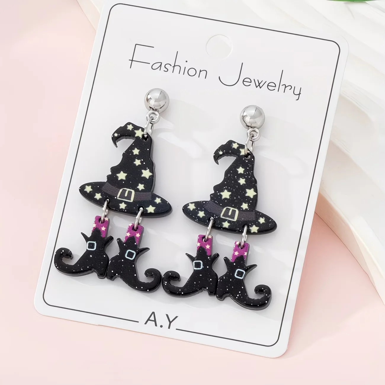 A Pair of Stylish Dangling Earrings Designed with Halloween-Themed Witch Hats And Boots, Perfect for Festive Parties