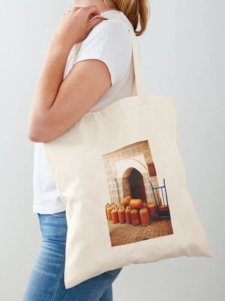  butane cylinders and a portal with tiles in Marrakech Tote Bag reusable shopping bag tote bags cloth bags Canvas Tote Bag