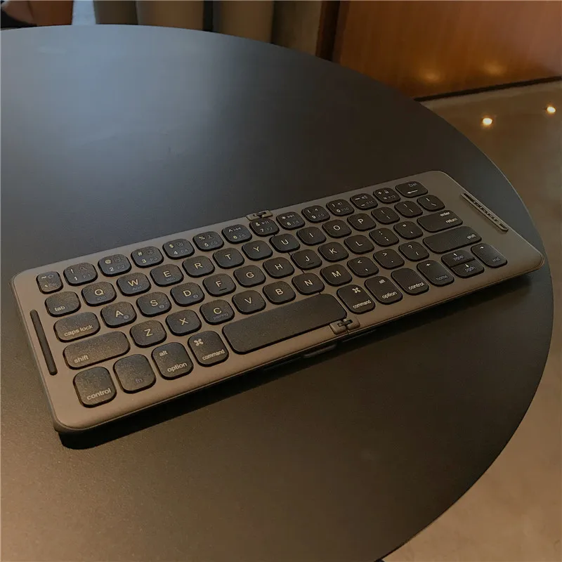 

Foldable Bluetooth keyboard wireless Suitable for mobile phones tablets and laptops Ultra-thin seamless portable Accessories