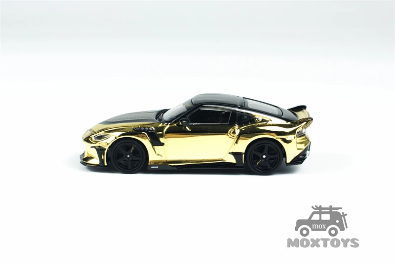 سيارة MINI GT 1:64 VeilSide FFZ400 كروم ذهبي 985 دييكاست #3