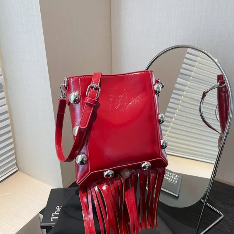 

PU Solid Color Tassel Hasp Shoulder Bag Rivet 2025 High Quality Women's Bags Popular Fashion Versatile Ethnic Crossbody Bag