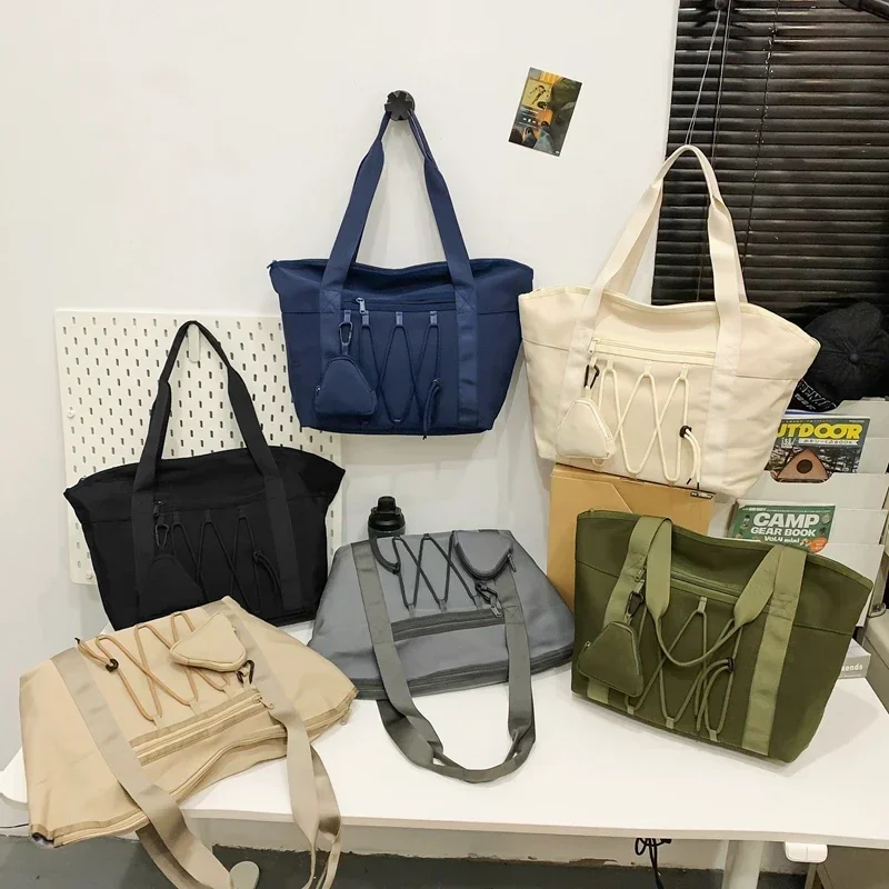 

Solid Color Oxford Zipper Travel Handbag Fashion Soft Trendy Crossbody Bag 2026 High Quality Large Capacity Simple Shoulder Bag