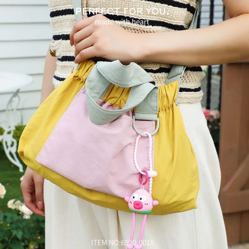 

Hot-selling canvas handbag for ladies,design-sense storage bag,waterproof color-blocking crossbody single-shoulder bag for women