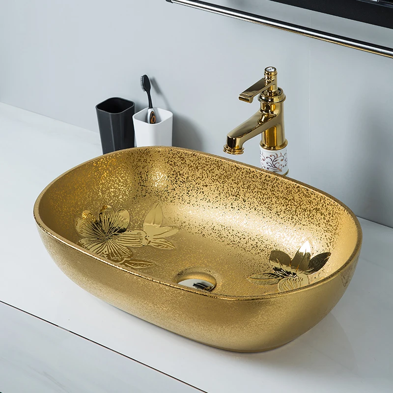 Simple European style light luxury gold-plated countertop basin oval ceramic washbasin single basin hotel clubhouse gold wash