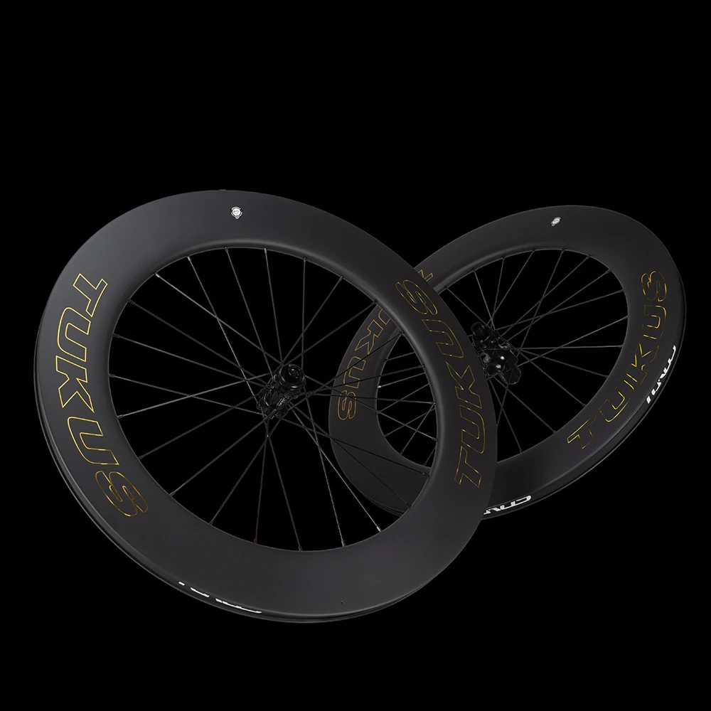 

Карбоновый колесный комплект TUKUS 700C для трековых велосипедов, фиксированная передача, флип-флоп, глубина обода 88 мм, ширина 25 мм, клинчерный, безкамерный.