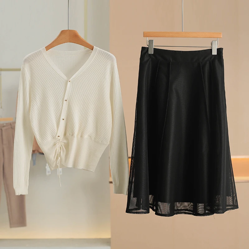 

Cute Drawstring Waist Knit Top And Half Skirt Set Spring 2026 New Brand Button Women's Fashion Set Long Sleeve Regular Fit