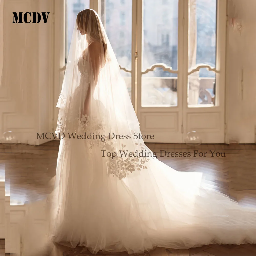 MCDV Bohemian Lace Appliques Abiti da sposa Senza maniche A-line Tulle Abiti da sposa Sweep Train Robe De Mariée Personalizzato