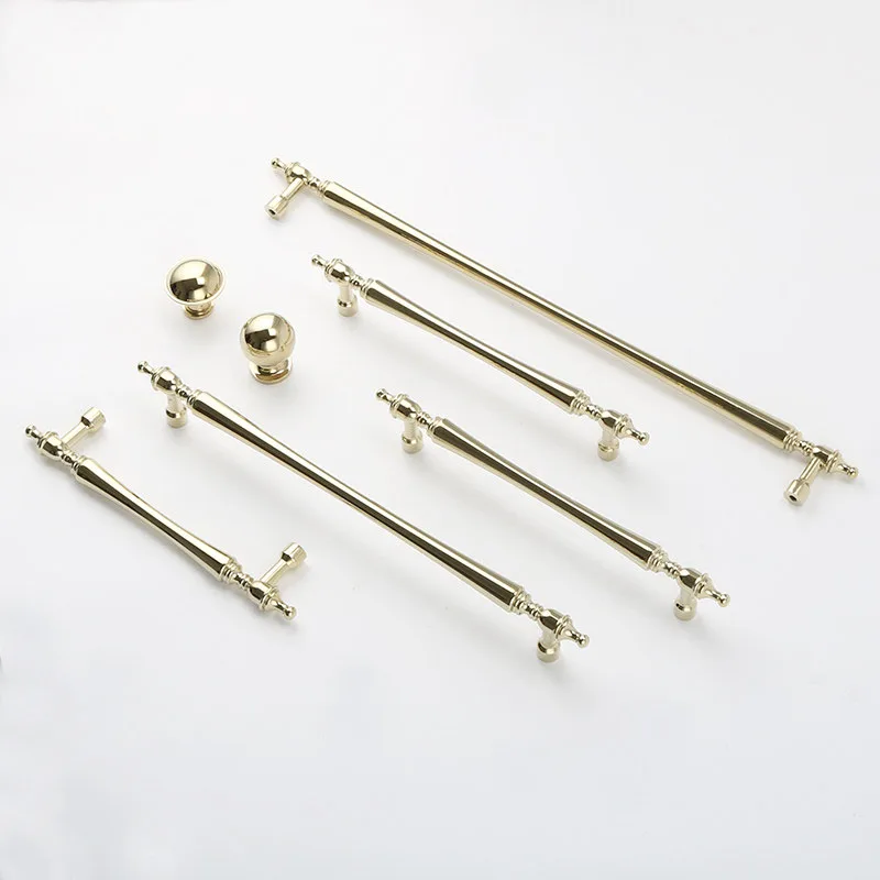Gold handle set arranged diagonally on a light background