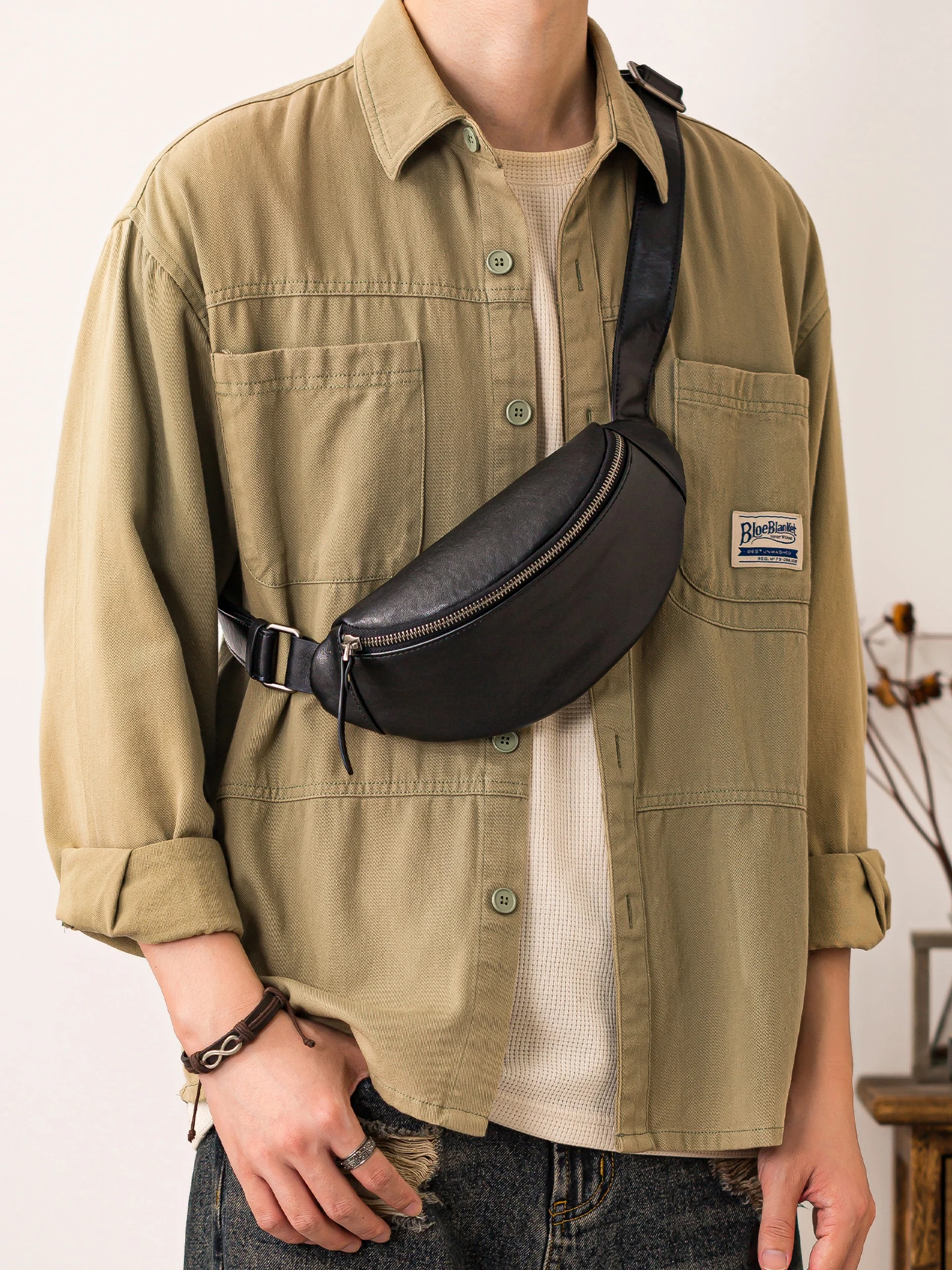 

PNDME outdoor daily sports genuine leather men black small chest bag designer handmade real cow leather motorcycle crossbody bag