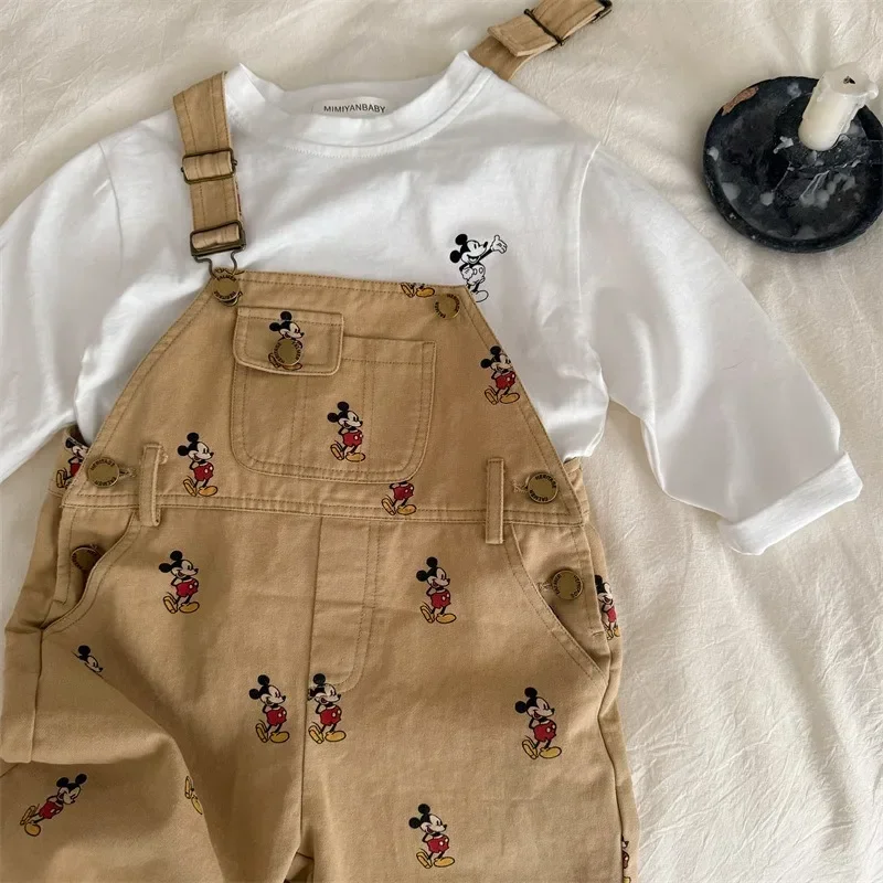 Monos para niños, novedad de primavera y otoño de 2025, pantalones holgados con estampado de dibujos animados para bebés y niñas, pantalones con tirantes, ropa para niños D70117
