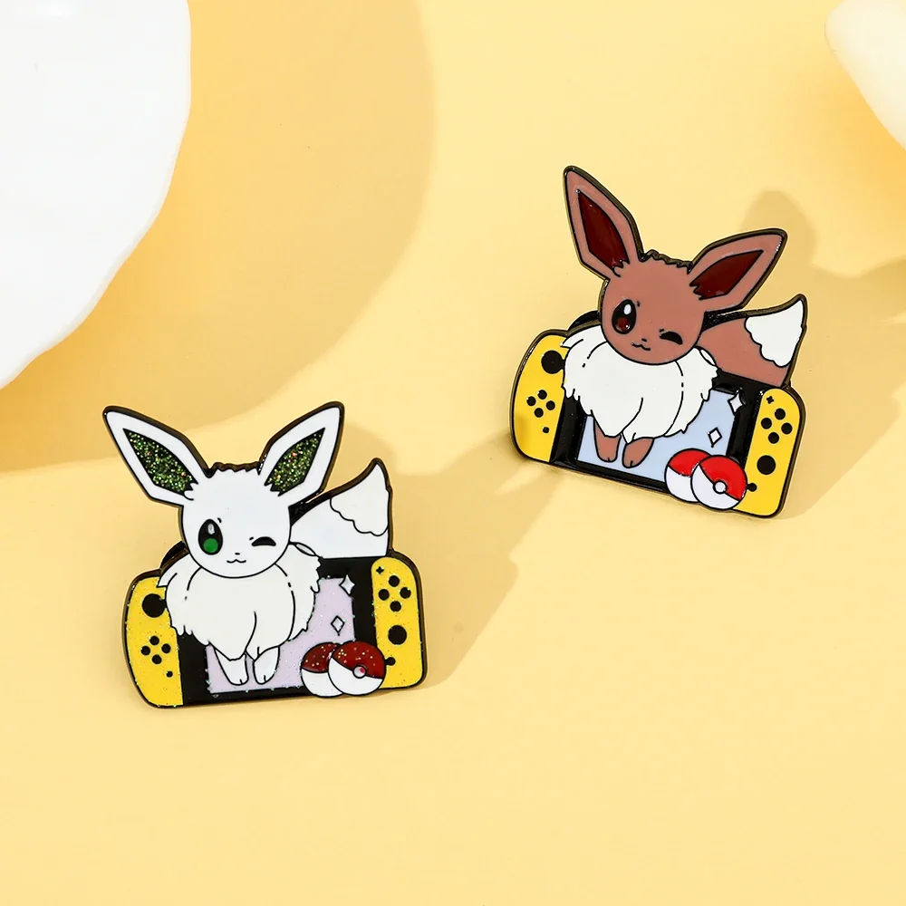 2 Pcs Anime Elf Cartoon Brooch Creative Eevee Game Console Enamel Pin Metal Badge Jewelry Clothing Backpack Accessories Gift view 3