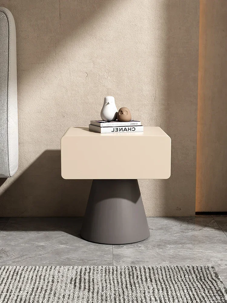 

A Cream creative bedside cabinet, small bedroom bedside cabinet, simple and modern small edge table, red baking paint small