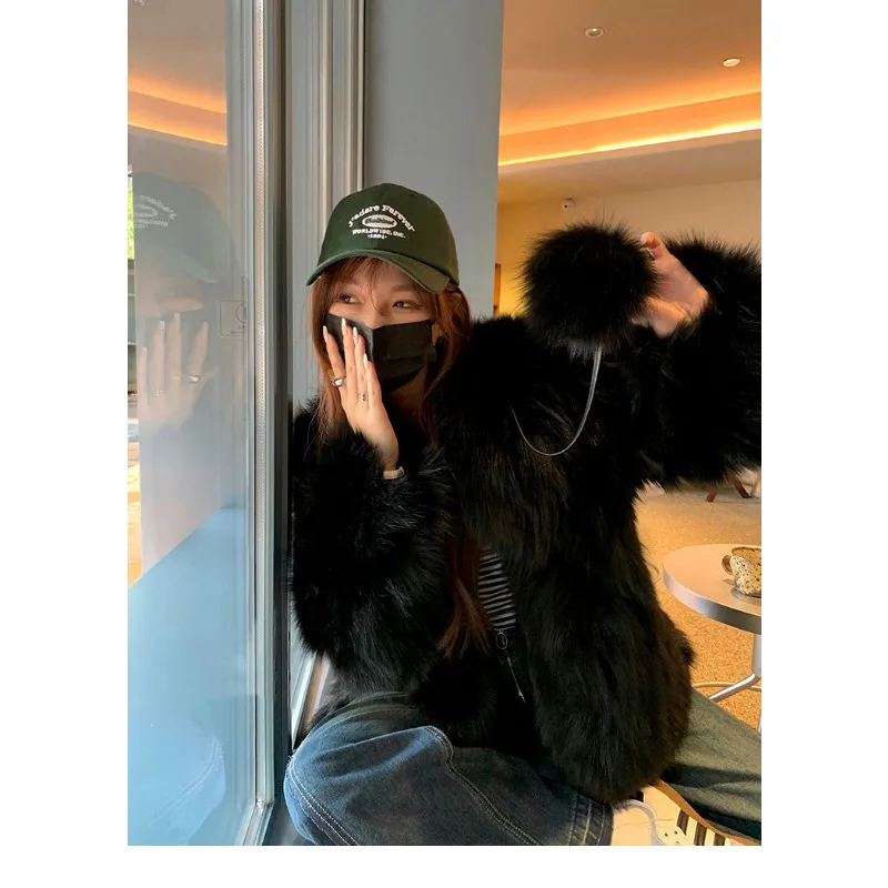 2025 nueva chaqueta de manga larga de otoño e invierno empalmado con cuello en V piel de zorro simulada moda suelta versátil Casual