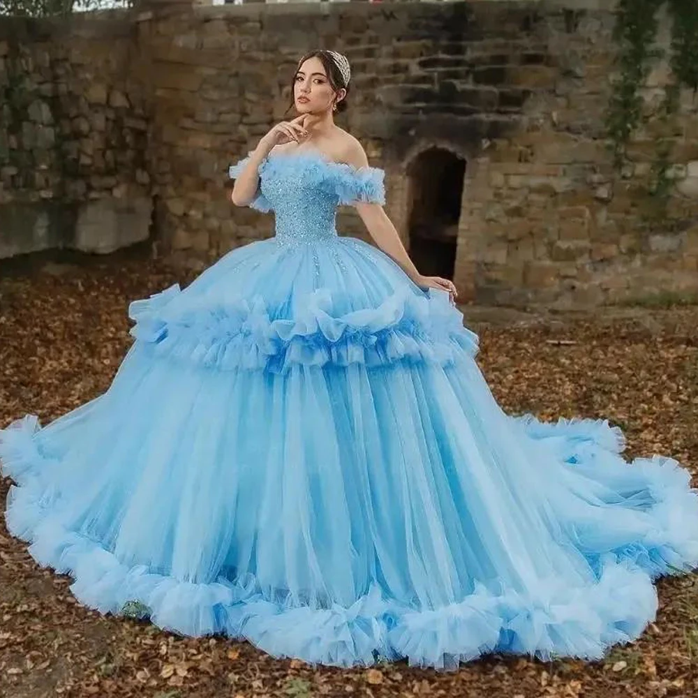 

Элегантные синие платья Quinceanera по индивидуальному заказу 2026 с открытыми плечами, кружевными аппликациями и оборками, тюлевое платье Vestidos de 15 на день рождения