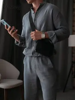 2025 Primavera Autunno Casual Uomo Cotone Abiti a due pezzi Manica lunga Colletto alla coreana Top e pantaloni Abiti Uomo Moda Set di colori solidi