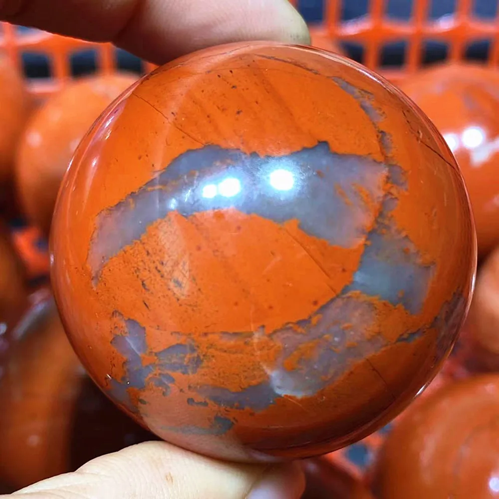 Natural red jasper stone balls with spiritual energy, chakra for home and office decoration, and as gifts