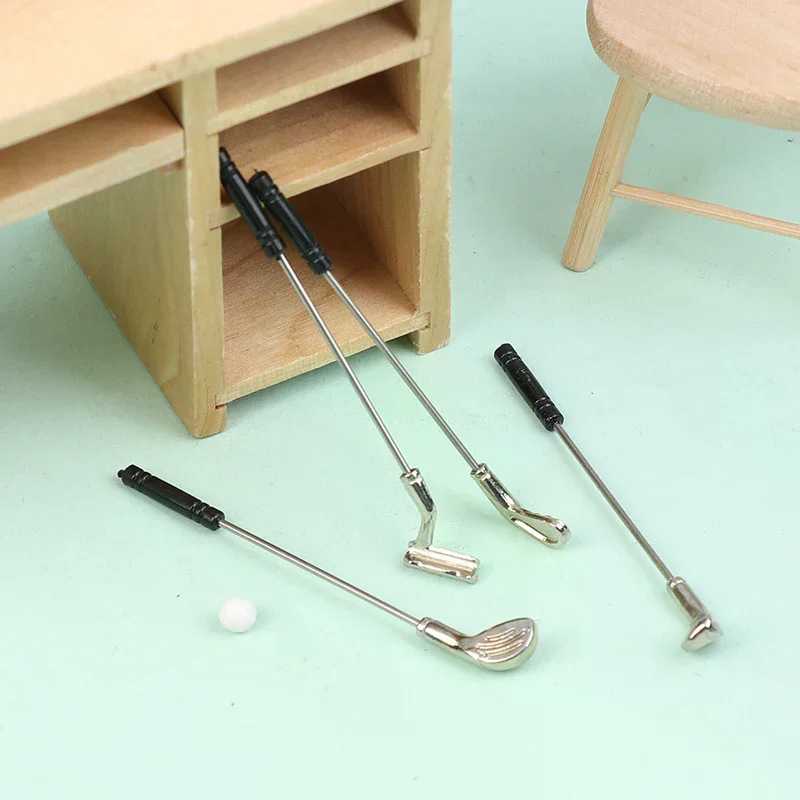 5 pièces/ensemble 1:12 échelle maison de poupée Miniature Clubs de Golf jouets modèle de Golf avec 4 bâtons et 1 balle semblant jouer jouets