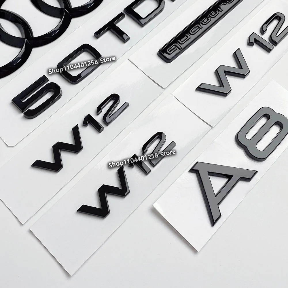 

Горячая новинка 2026: Эмблема Audi 4-кольцевой (черная, ABS) для капота, передней решетки, заднего багажника — A8 Quattro, W12, 50 TDI. Эмблема для автомобиля.