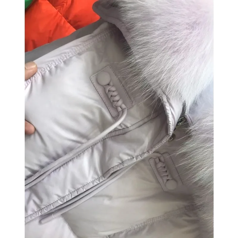 女性のチャイニーズノットファーカラー韓国版ショートライト高級ファー本物の防寒と暖かいジャケットコート新しいダウンジャケット