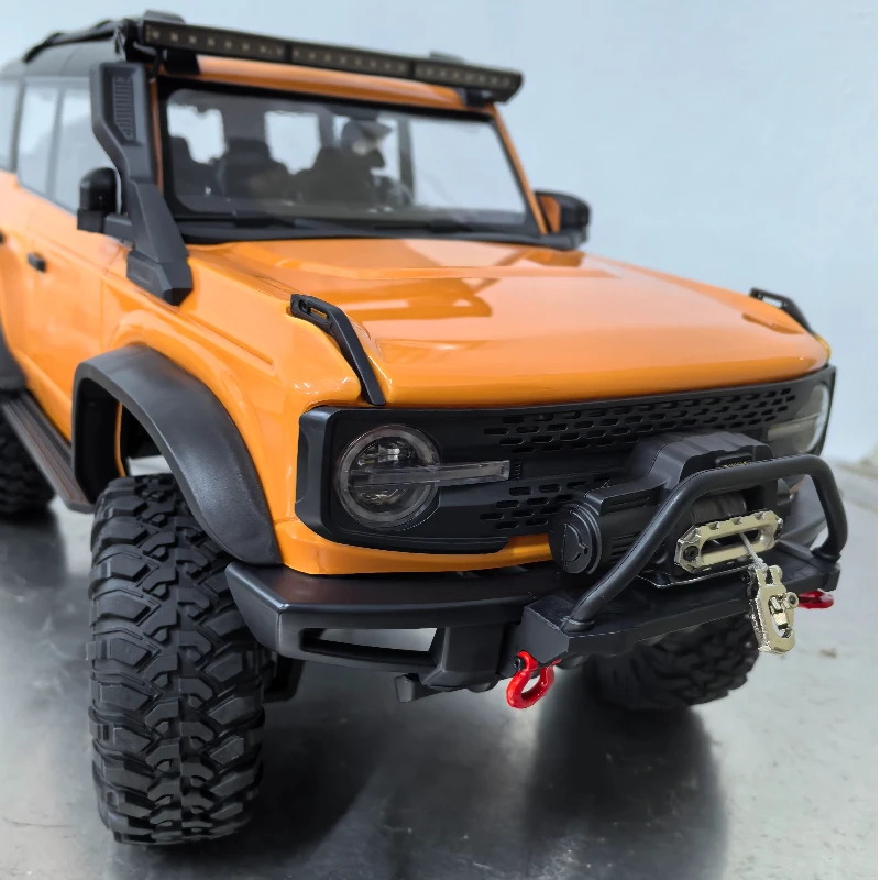 Nuevas actualizaciones 2025 HB R001 Bronco con cabrestante eléctrico 1/10 4WD Control remoto vehículo todoterreno modelo eléctrico RC escalada