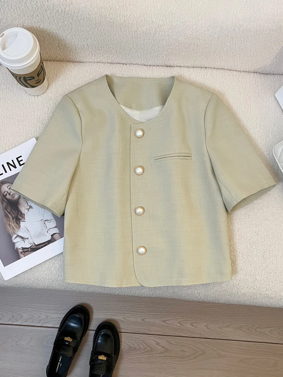 Spring and summer women's casual solid color round neck short sleeved pocket decorative jacket