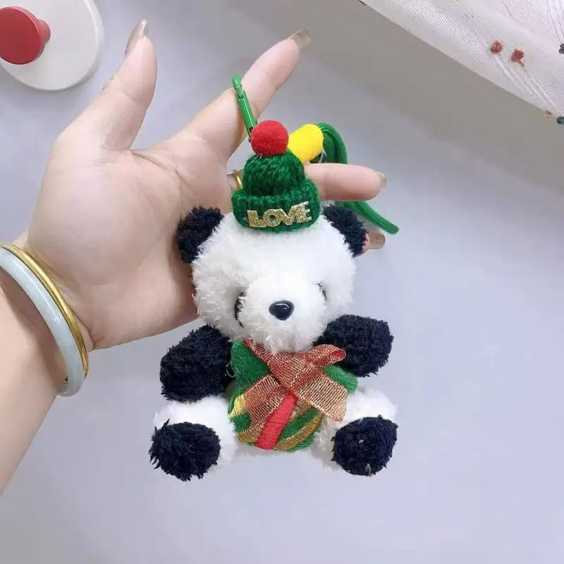 Feliz natal vermelho e verde chapéu de malha camisola trança corda panda abraço sino de natal macio pelúcia boneca chaveiro presente do casal