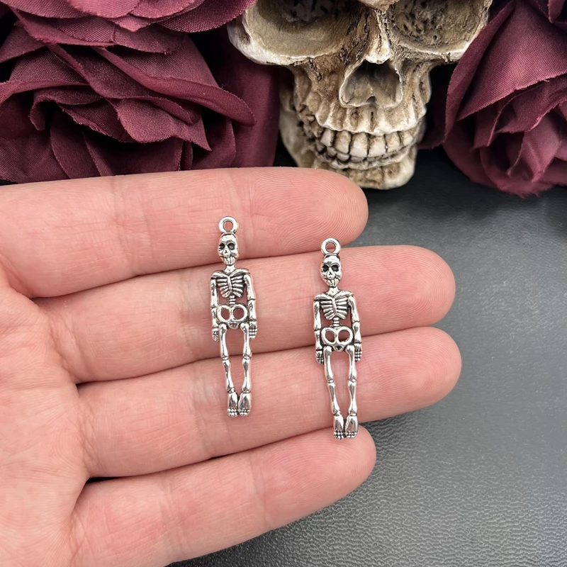 12 sztuk Charms czaszka szkielet mężczyzna 39x9mm antyczne srebro kolorowe platerowane wisiorki dokonywanie DIY Handmade tybetański znalezienie biżuterii — zdjęcie 4
