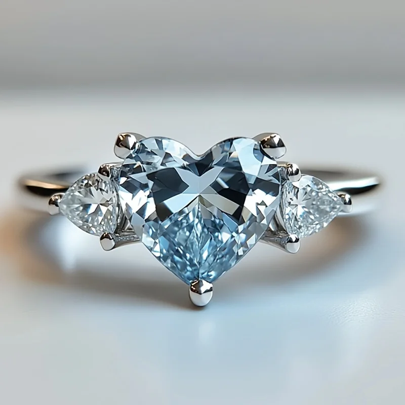 

SGARIT 925 Sterling Silver Women's Ring Blue Heart-Shaped Crystal and Matching Side Stones Elegant Dainty Jewelry Gift for Her