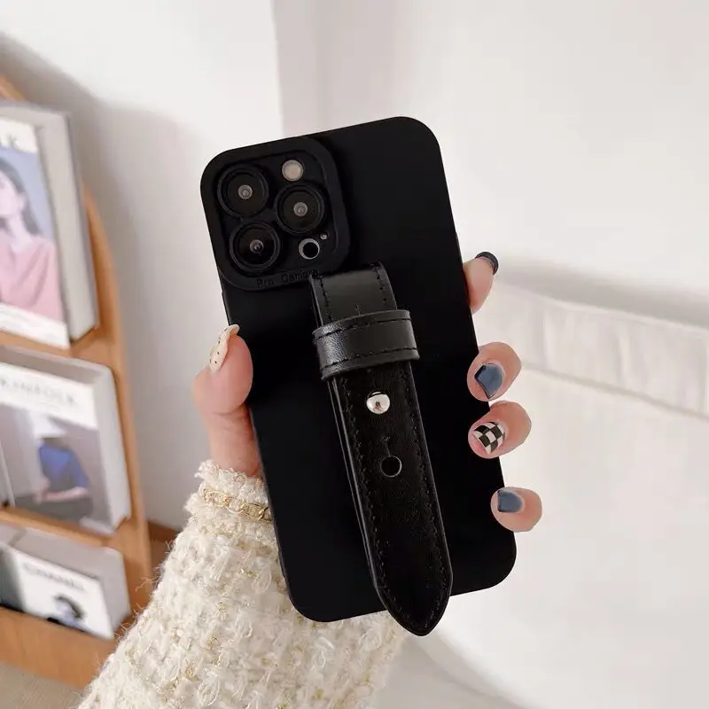 IG KOL PU معصمه حامل جراب هاتف آيفون 16 15 14 13/12/11 بروماكس XS 78P XR SE2/3 6s غطاء كامل الجلد قذيفة حماية الجسم