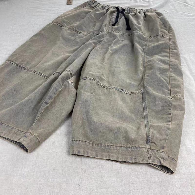 Letnie damskie spodnie jeansowe z bawełny, luźne, z elastyczną talią na sznurki, długość do kostki, łączona konstrukcja, cienkie haremki, wysoka jakość.