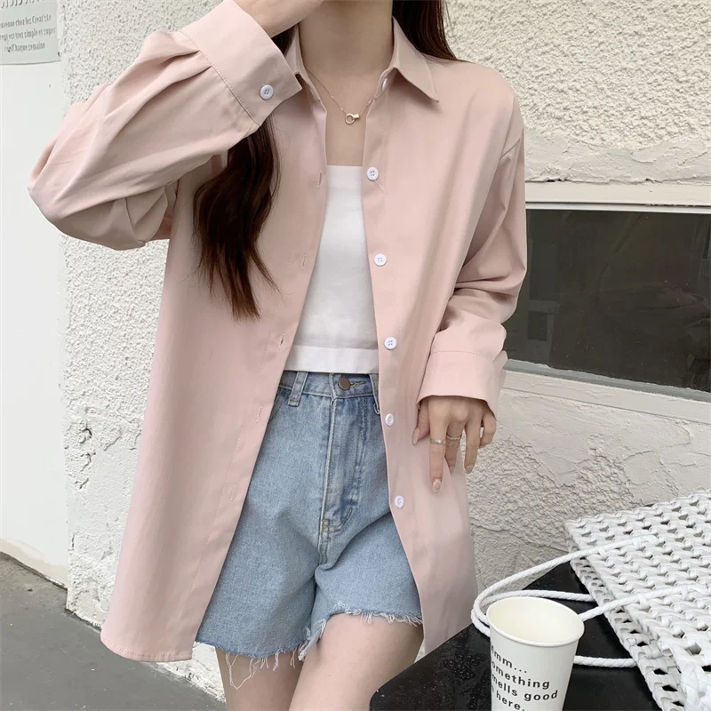 Nueva camisa holgada blanca de manga larga para mujer, estilo francés, Simple, Color sólido, Tops informales de un solo pecho, abrigo fino para primavera y verano