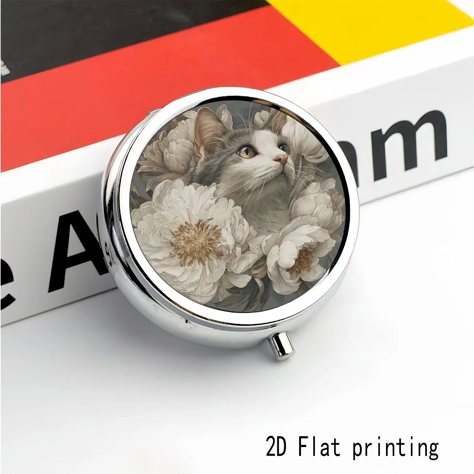 Golden-Eyed Gray Cat Looking up at the White Floral Pattern, Two Types of Small Pill Boxes Available for You to Choose From: One with Three Round Compartments and the Other with Two Square Compartments, Portable Medicine Storage Suitable for Handbags or Travel, Elegant Design, Polished Finish, Exclusive for Daily Medication Users.