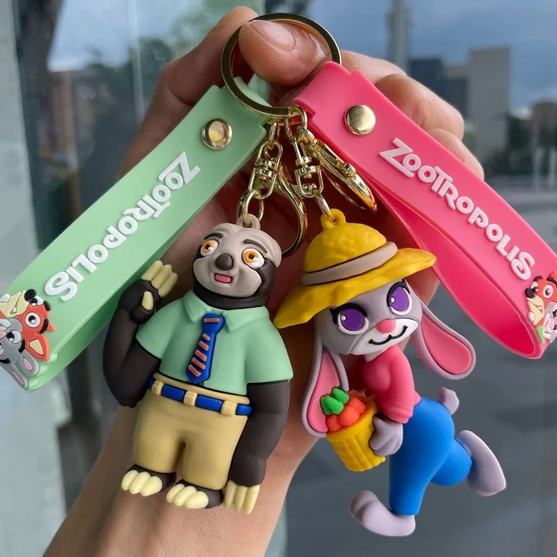 مجموعة سلسلة مفاتيح للزوجين من Disney Anime Zootopia Judy Hopps وNick Wilde - شماعة حقيبة الظهر مناسبة لتقديم هدايا عيد الميلاد