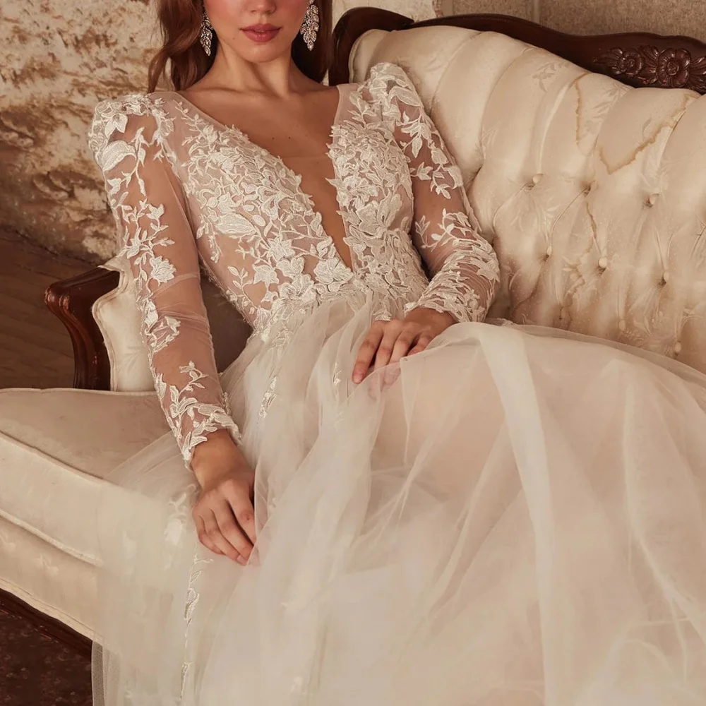 فستان زفاف رائع مخصص بياقة على شكل V وأكمام طويلة فساتين العروس على شكل حرف A فساتين زفاف أنيقة من فيستدوس دي نوفيا