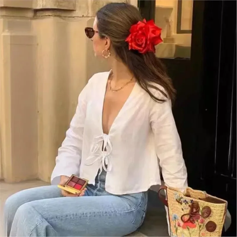 

Женская повседневная блузка с глубоким V-образным вырезом и шнуровкой, длинными расклешенными рукавами, свободного кроя, элегантная, для весны и лета, новая, стильная, женская одежда.