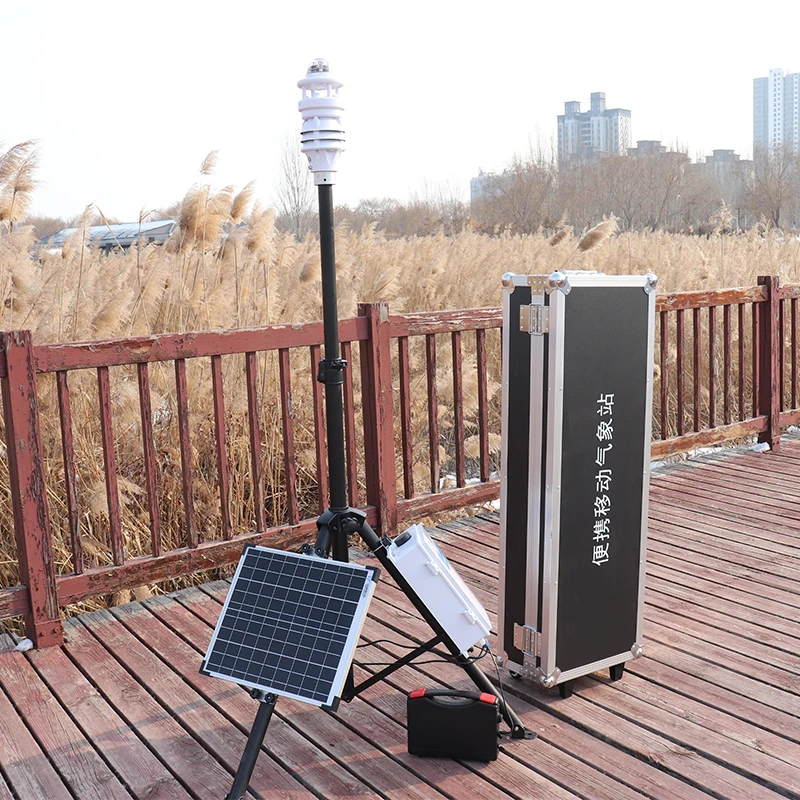 Solar-powered automatic weather stations with rain, wind, radiation, temperature, and humidity sensors for outdoor monitoring