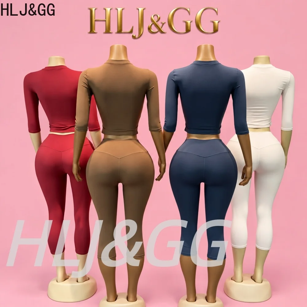 HLJ&GG Women High Quality Activewear Set Casual Stretch Round Neck Short Sleeve Top And High Waist Capri Pants Two Piece Outfit view 2