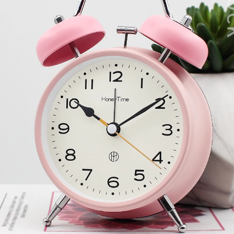 Decorazioni per la casa forniture per studenti cartone animato faccia campana in metallo sveglia comodino silenzioso Sweep secondi orologio da tavolo carino lampada da notte