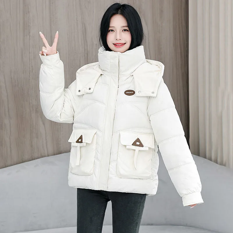 เสื้อแจ็คเก็ตผ้าฝ้ายสำหรับฤดูหนาว แจ็คเก็ตผ้าฝ้ายบุนวมสำหรับผู้หญิงแบบใหม่ ทรงหลวม หนา อุ่น มีฮู้ดถอดได้ เสื้อคลุมกันหนาวแบบมีซับใน