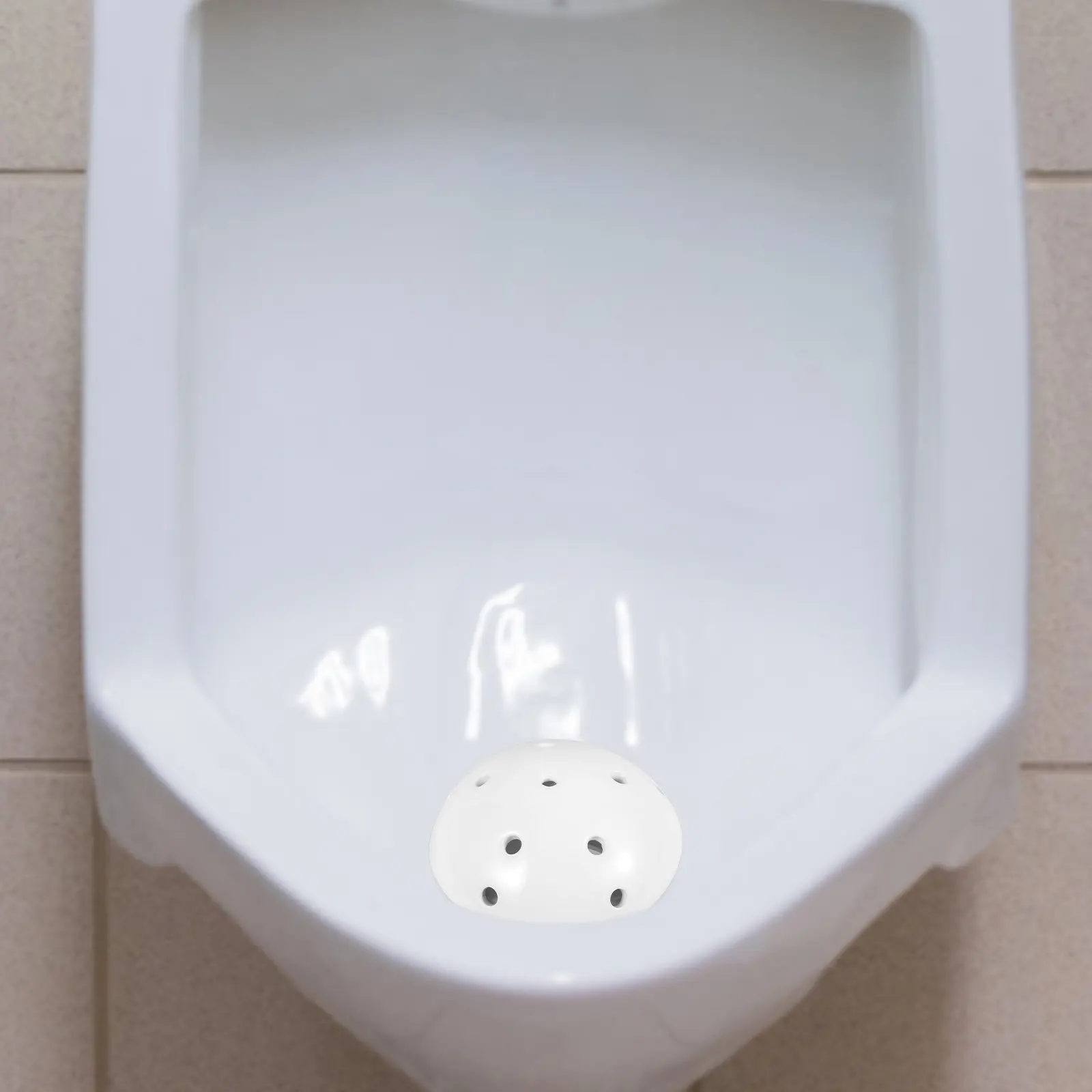 

Фильтр-заглушка для слива писсуара в ванной комнате: предотвращает неприятные запахи, прочный материал, подходит для различных типов унитазов, прост в уходе.