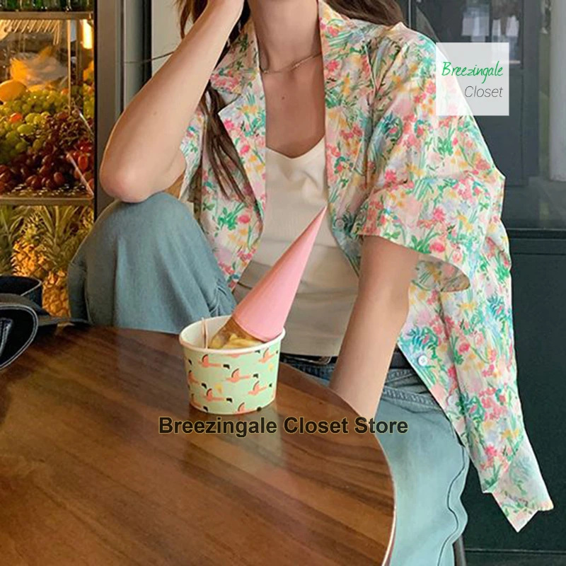 Japanese pastoral oil painting floral shirt female summer new fashion temperament dopamine wear Joker casual chiffon top.