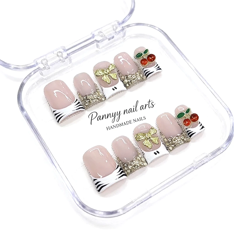 

Duck Tip Press On Nails 10Pcs Handmade Nude Zebra Nails With Gold Bows Red Cherry Charms Y2K Sweet Reusable Gel Acrylic Nails