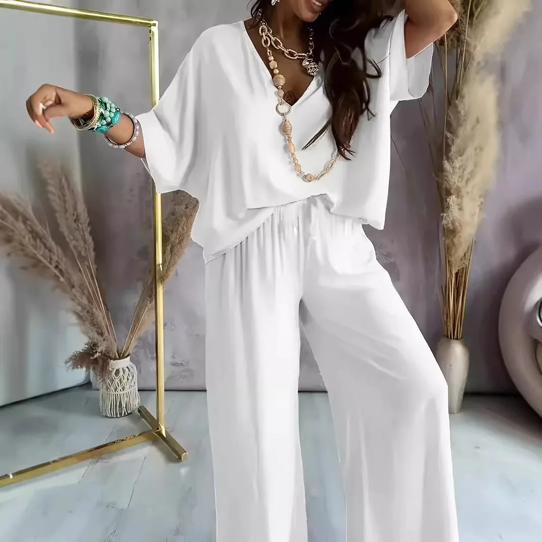 

Комплект 2026: топ с V-образным вырезом и рукавами «летучая мышь» и повседневные брюки — стильный и универсальный